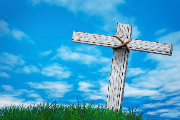 木十字架或宗教符号形状的日落天空图片下载