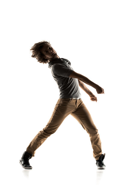 嘻哈舞者表演孤立在一个白色的背景图片下载