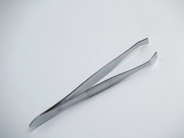 白底黑底上的镊子图片下载