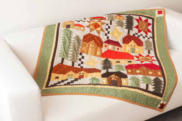 拼接的棉被。毛毯的一部分作为背景。图片下载