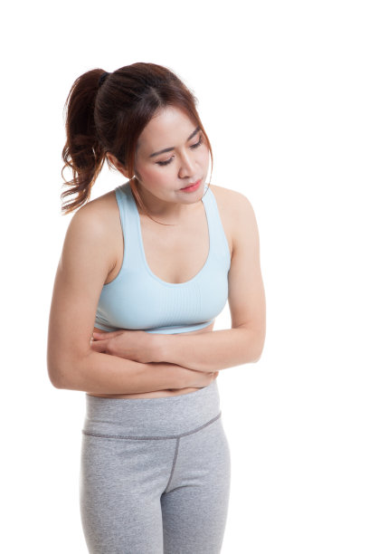 亚洲健康女孩胃痛。图片下载