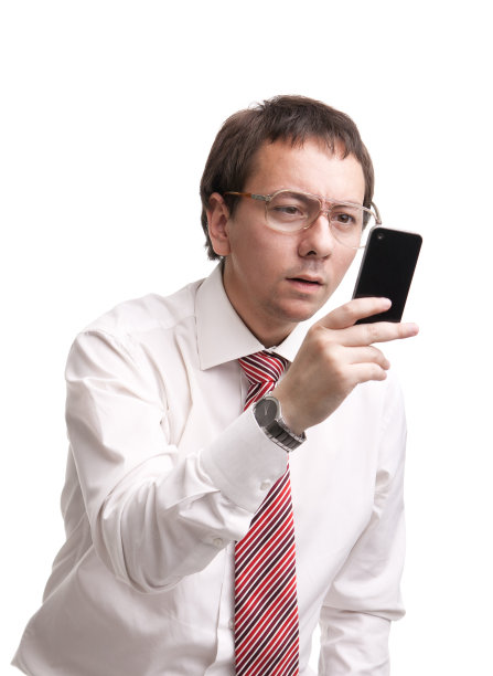 拿着智能手机的书呆子商人图片下载