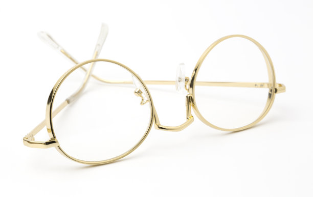 金色眼镜折叠孤立在白色图片下载