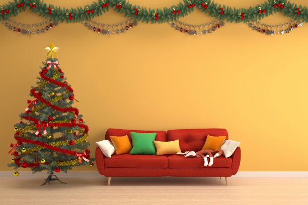 圣诞树在黄色的客厅和红色的沙发图片下载