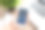 女性手里拿着手机和上网的火车票和笔记本图片下载