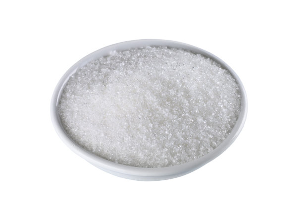 白糖在白碗孤立的背景素材图片