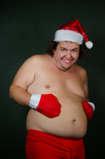 有趣的脂肪圣诞老人。图片下载