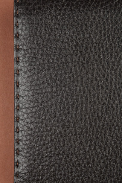 深棕色皮革纹理与针图片下载