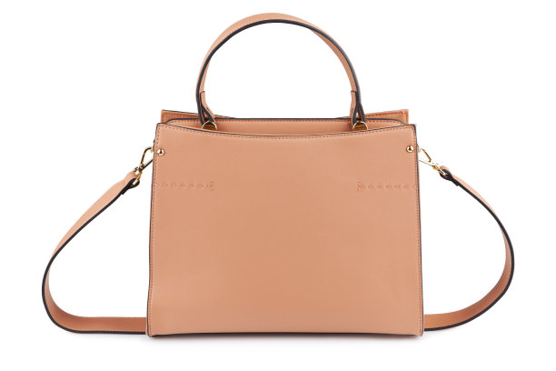 女人的米色手袋与阴影图片下载