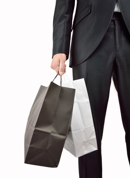 拿着购物袋的商人图片下载