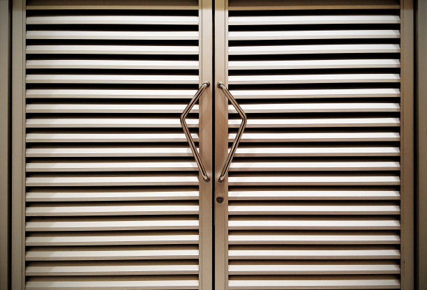 不锈钢门把手和背景照片图片下载