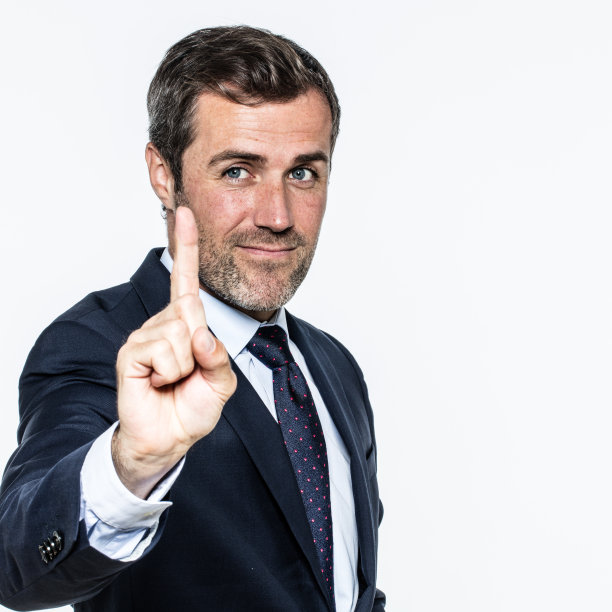 微笑的商人为了时间的管理或自信的领导图片下载