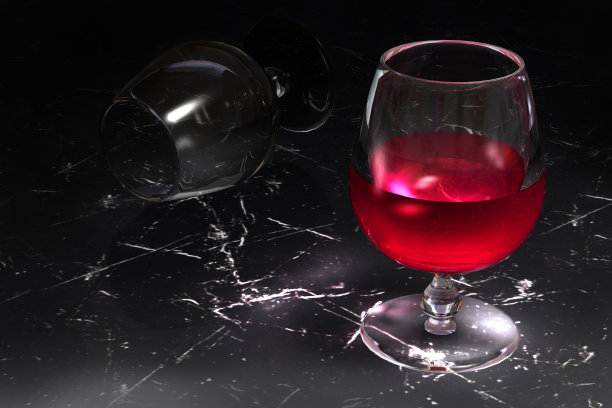 黑色大理石背景上的一杯漂亮的红酒。图片下载