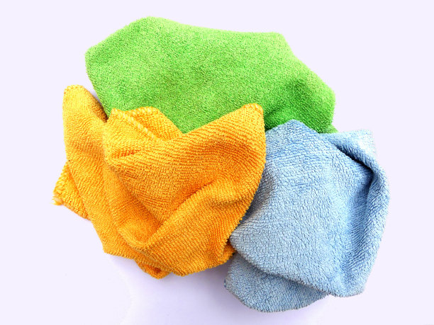 绿色，蓝色和黄色的微纤维布在白色的背景图片下载