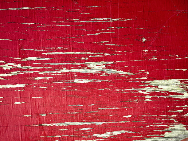 油漆过的旧木墙。红色的背景图片下载
