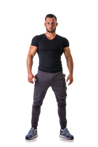 英俊的运动员站着，孤立无援图片下载