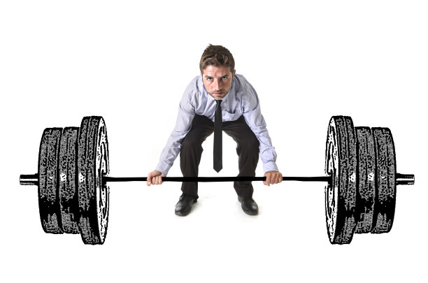公司综合有吸引力的商人举重重哑铃图片下载