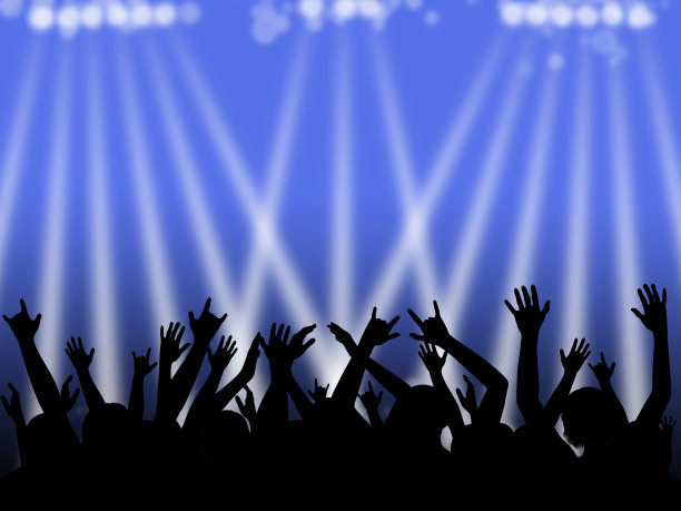 跳舞的人群与蓝色和白色的灯光图片下载