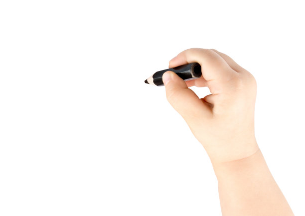 孩子手里拿着黑色的铅笔图片下载