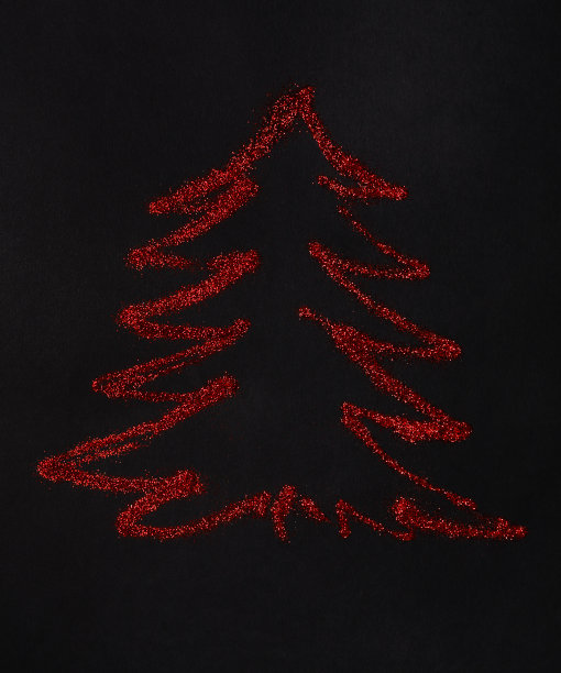 圣诞树。红色闪光散布在黑色，抽象的背景上。图片下载