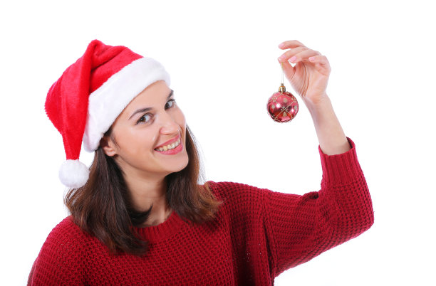 年轻的圣诞女人举行圣诞舞会图片下载