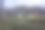 抽象模糊照片的雨滴在汽车窗户上图片下载