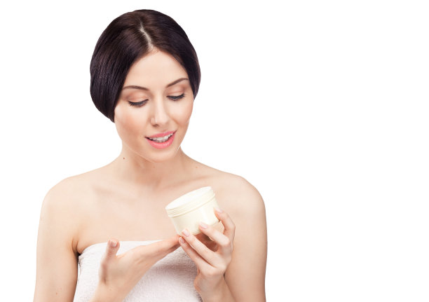 年轻女子拿着面霜图片下载