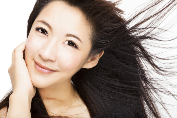 美丽女人的脸与头发的运动素材图片