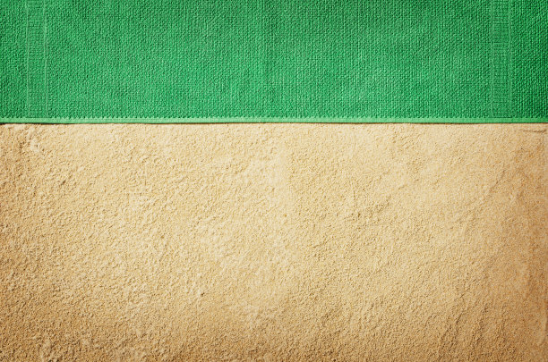 沙滩上的顶视图毛巾。背景与复制空间图片下载