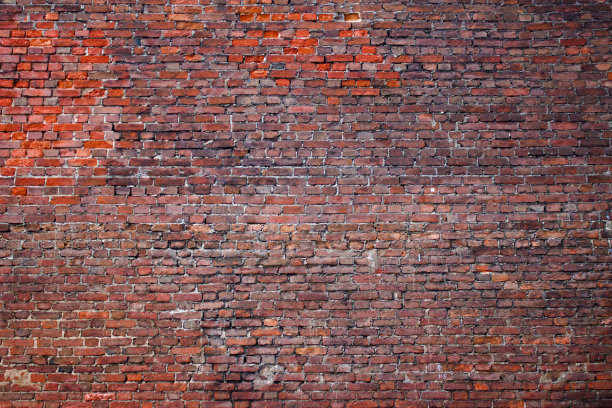 垃圾砖墙，红色纹理，背景风化表面素材图片