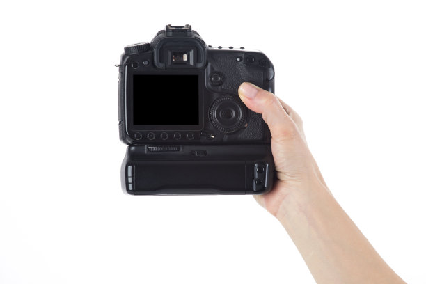 女性手持数码相机图片下载