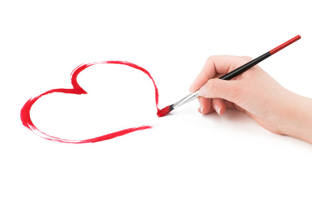 女人的手画出了心。图片下载