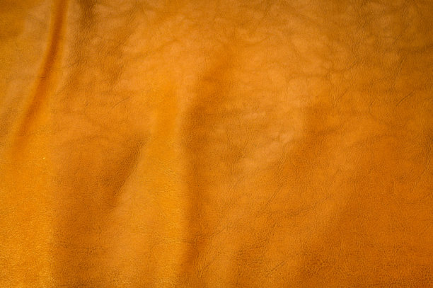 橙色被揉皱的皮革背景纹理图片下载
