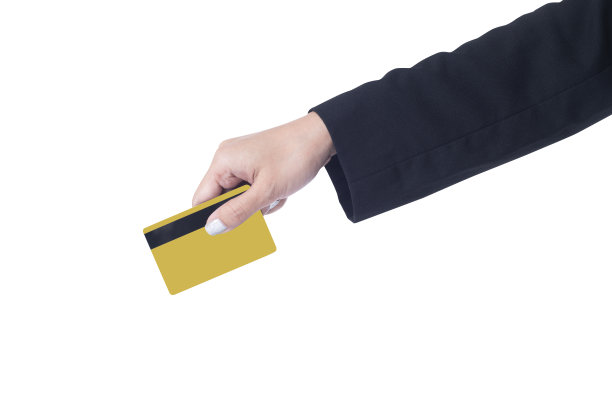 手握黄金信用卡与夹路隔离图片下载