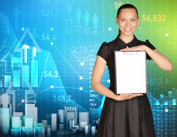 女商人站在金融图表的背景下图片下载