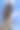 蓝色天空背景上的鸟鹰石雕图片下载