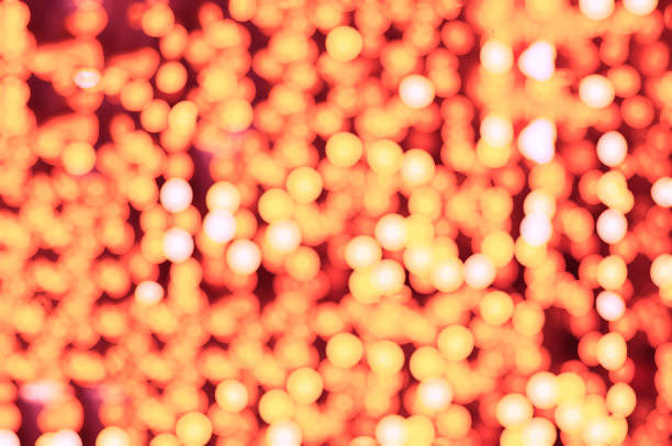 橙色点散焦背景图片下载