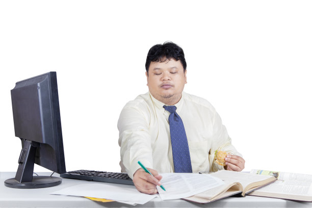 经理一边吃汉堡一边在纸上写字图片下载