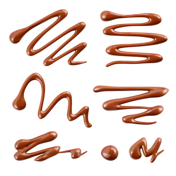 牛奶巧克力。酱汁图案和滴孤立的白色背景。剪切路径。收集。图片下载