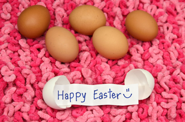 粉红色织物上带彩蛋的彩蛋图片下载