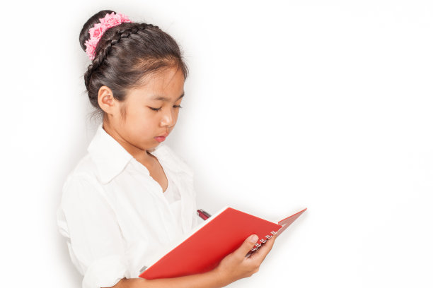 可爱的小女孩学习和写作图片下载