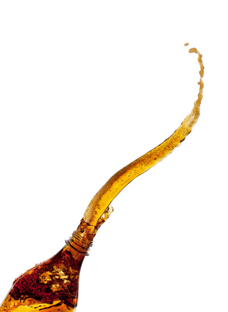 可乐从瓶子里溅出来图片下载