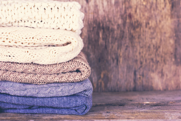 一堆羊毛衫，格子呢图片下载