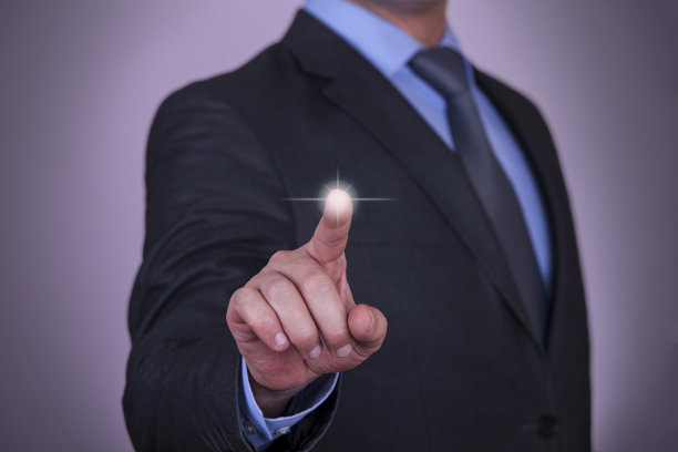 手指按按钮的商人图片下载