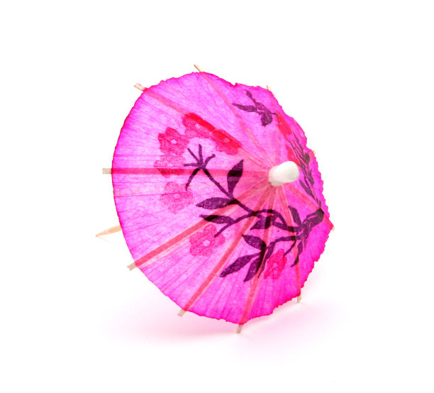 粉红色的鸡尾酒伞，在一边图片下载