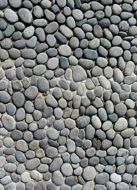 鹅卵石的灰色背景。照片图片下载