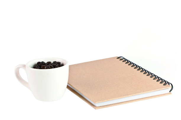 纸笔记本前盖和咖啡饲料在帽图片下载