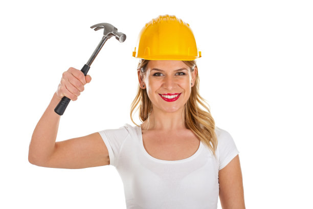 性感的女工程师，手里拿着锤子图片下载