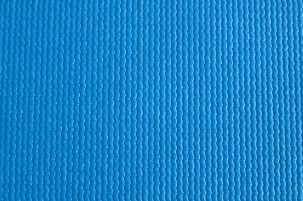 蓝色健身瑜伽垫表面纹理近距离观察。图片下载
