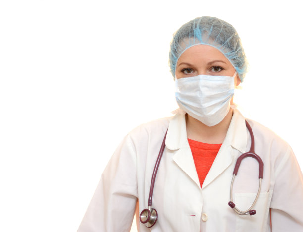 医生与外科口罩，帽和听诊器素材图片